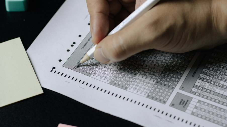 Learn how to meet the English language and Life in the UK test requirements for British citizenship. KoLL requirement explained.